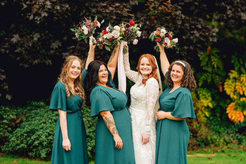 Bride and bridesmaid in green dress 