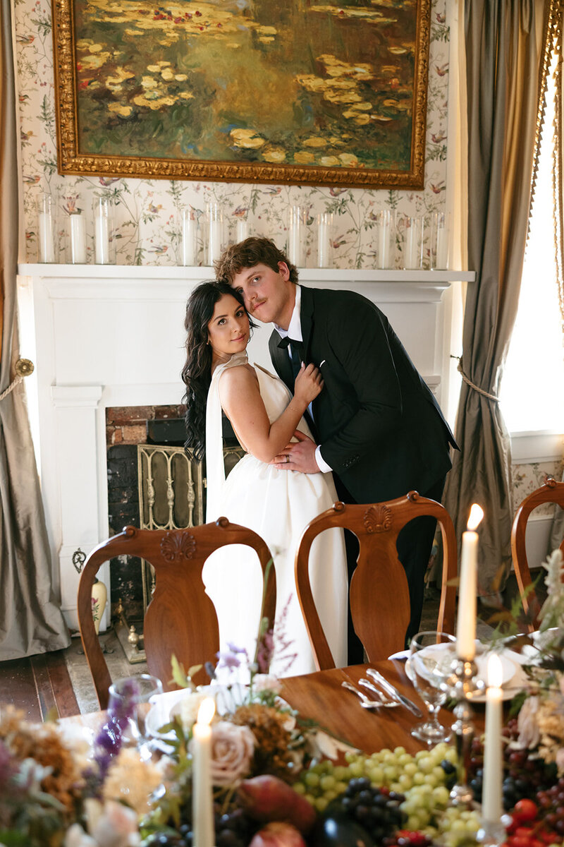 Warm, nostalgic portrait of bride and groom in ornate room at Nashville wedding