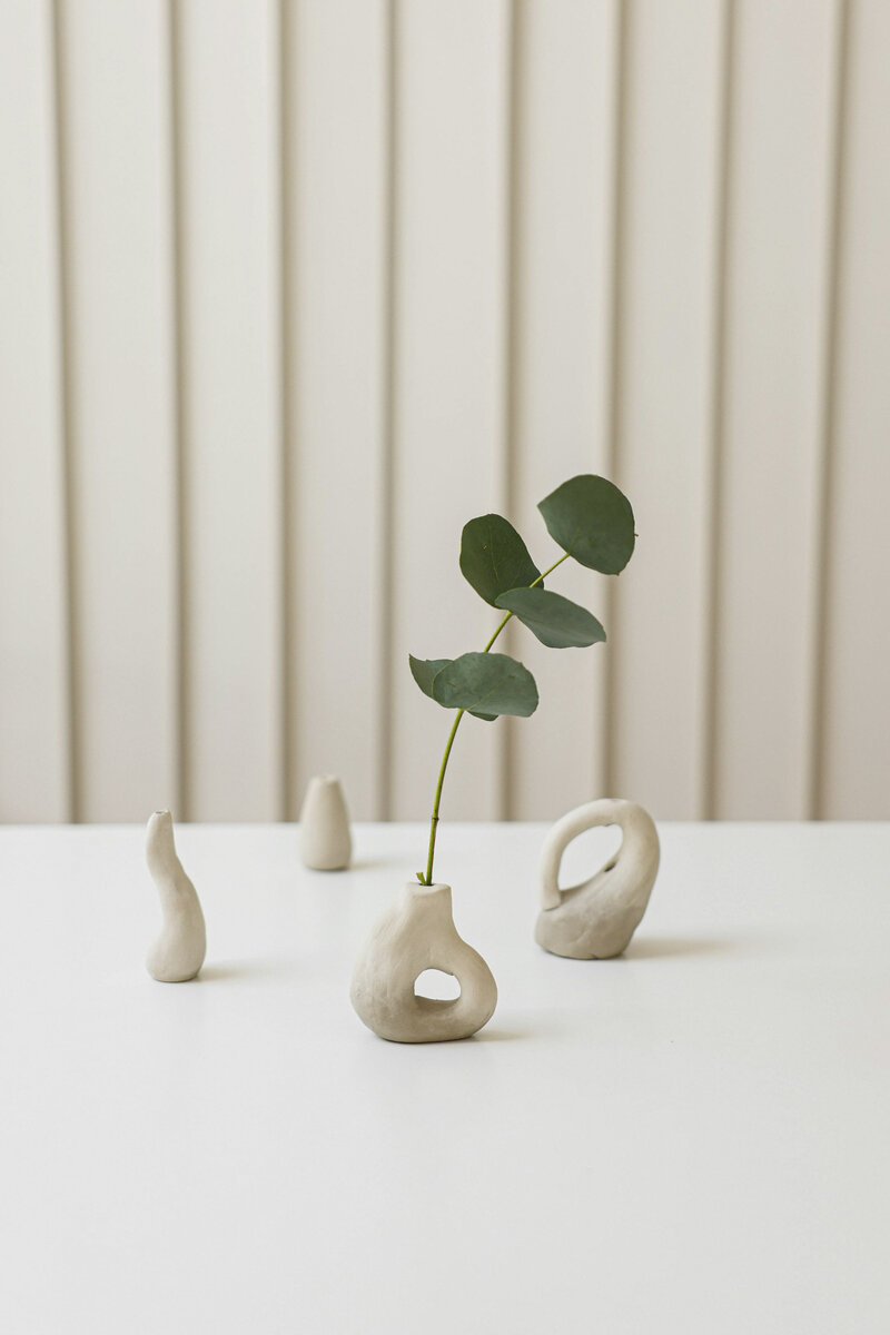 Vases and plants on a table in a medical office