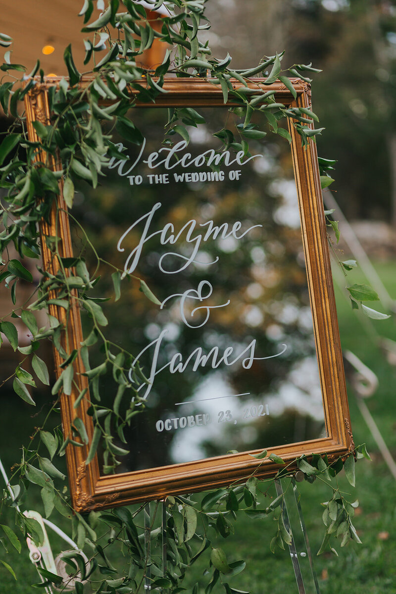 Gold mirror welcome sign  with calligraphy rental