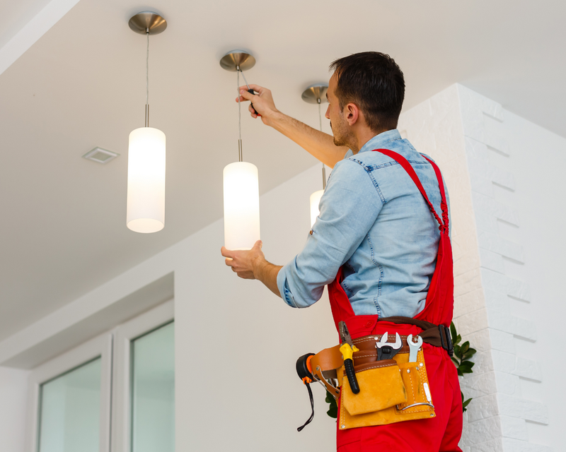 Nate from Nate’s Handyman Co. repairing a wood deck for a homeowner in the Upstate SC. Image shows professional deck repair work including replacing damaged deck boards and reinforcing the structure. Reliable deck repair and deck building services available in Greenville, Travelers Rest, Greer, Taylors, and surrounding Upstate areas