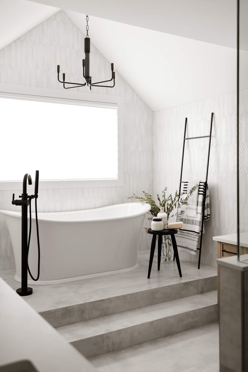 Ensuite bathroom with freestanding tub, floor to ceiling tile and black accents. 