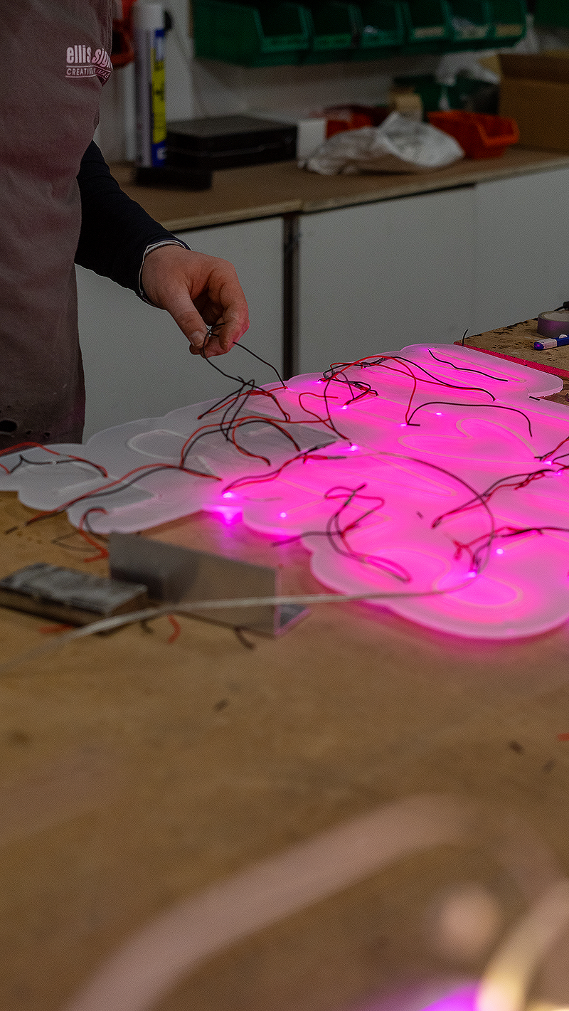 Ellis Signs making a custom pink neon sign