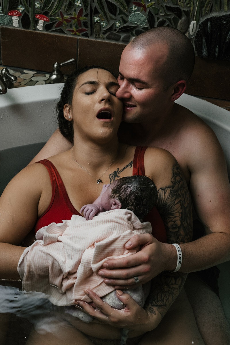 Doula Natalie supporting a laboring person