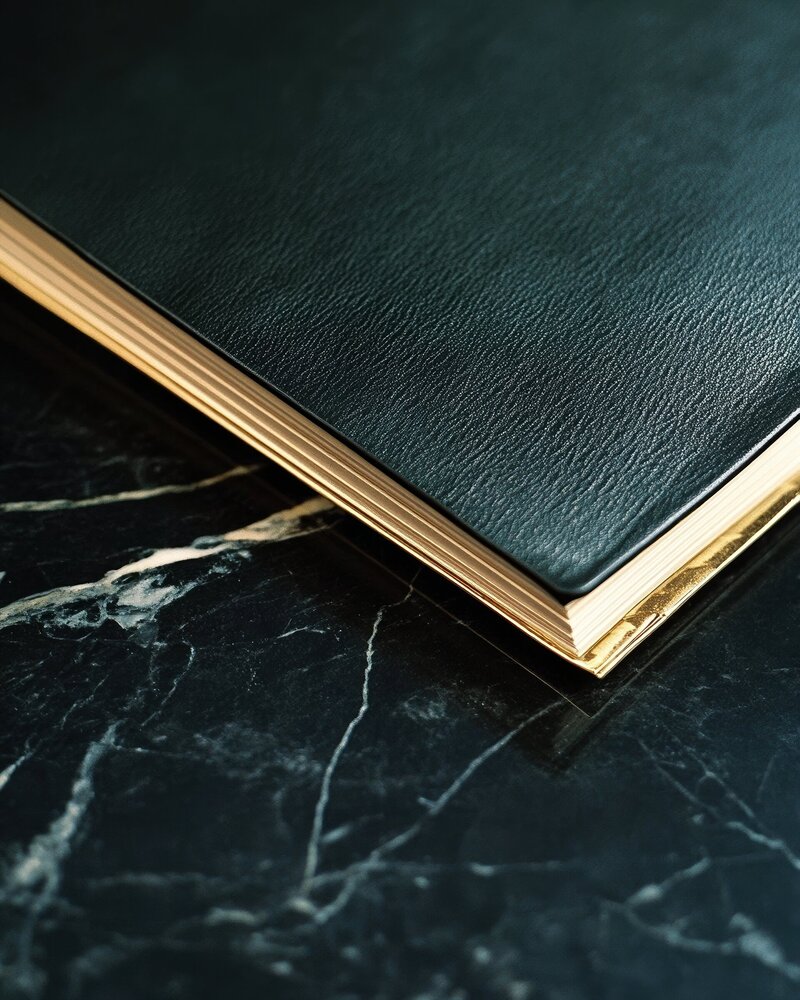 A sleek phone mockup displaying a modern 'Boost Your Skills' design, styled with a glass cup and a neutral, professional tabletop setting