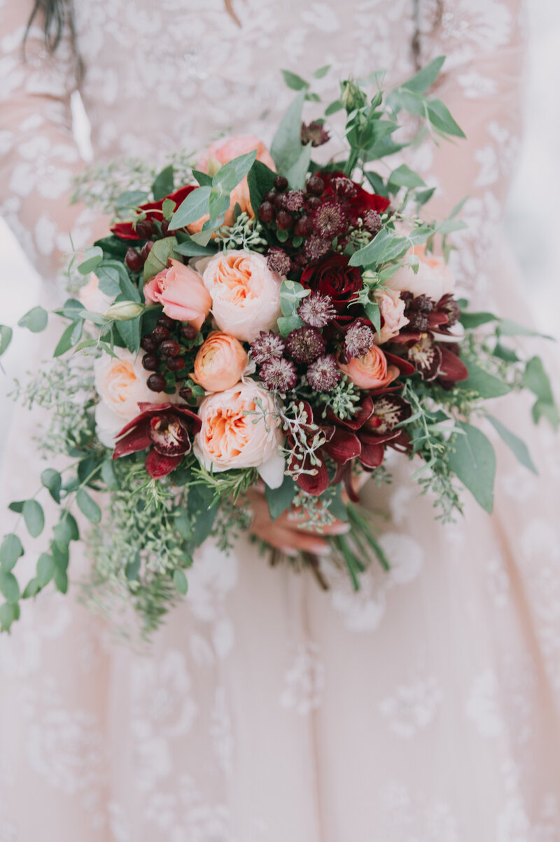 Love this bouquest for a winter wedding with a pop of color