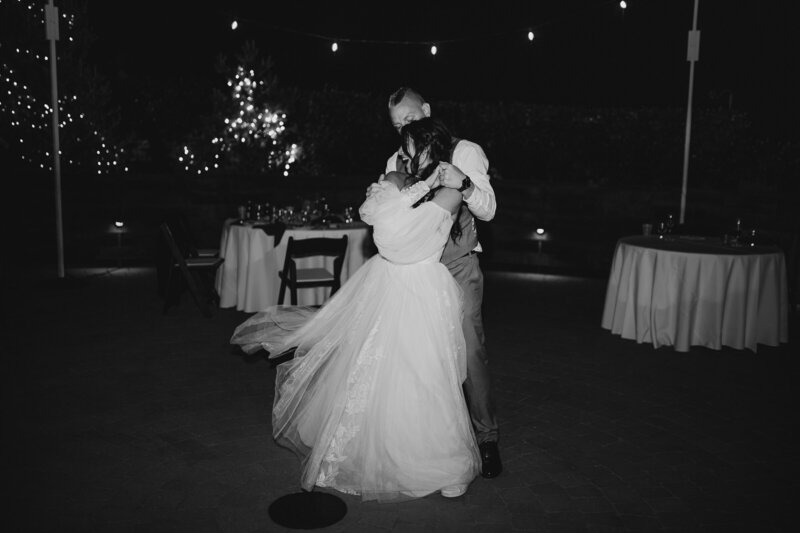 boho bride and groom during their first dance to a hamilton theme song
