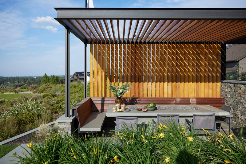 mountain-modern-home-outdoor-dining-louvered-wood-pavilion