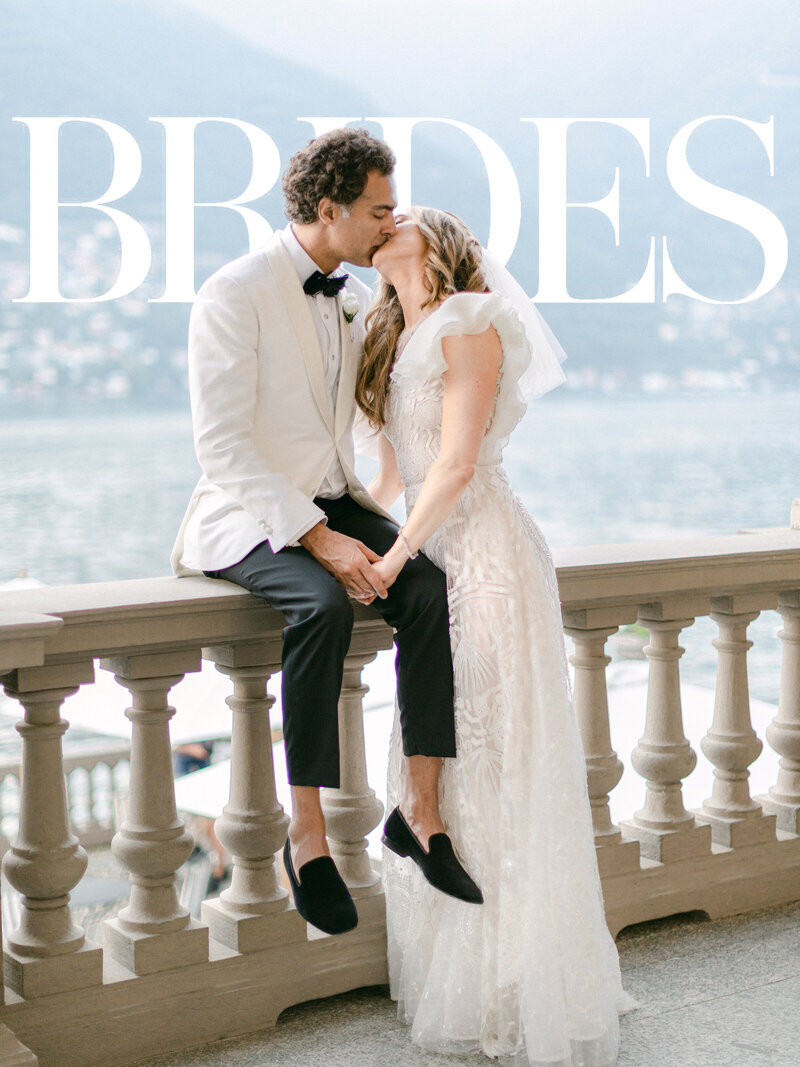 Mens wedding shoes surrounded by white flowers