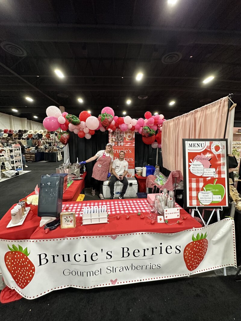 Brucie's Berries founders at event
