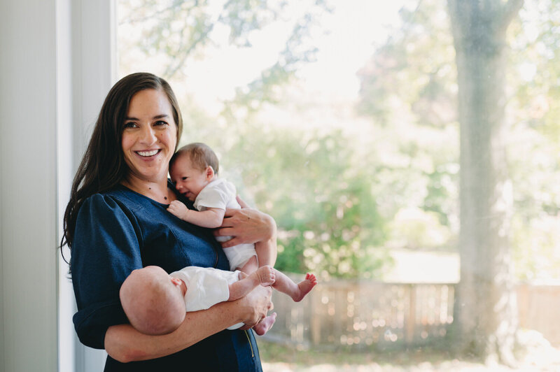 mom holding twins photographed by NPS Photography