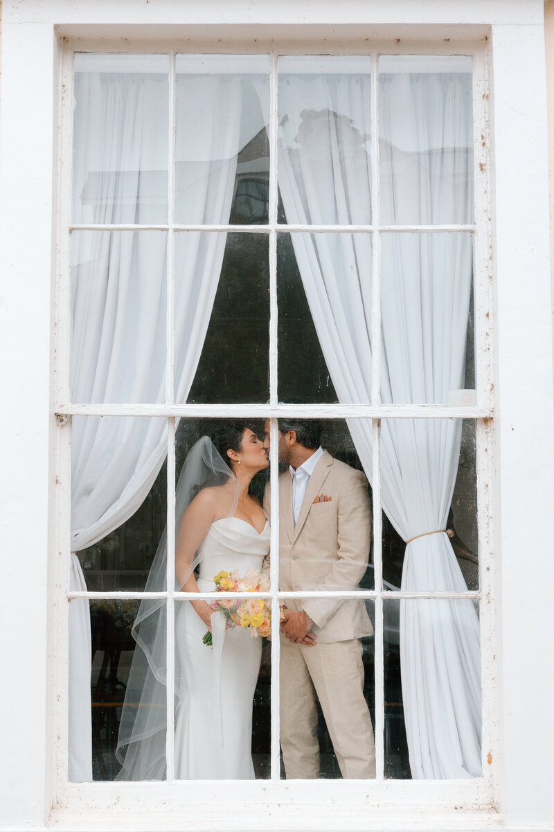 Documentary photography of a joyful 'just married' moment at Historic Whitewood in Powhatan, VA