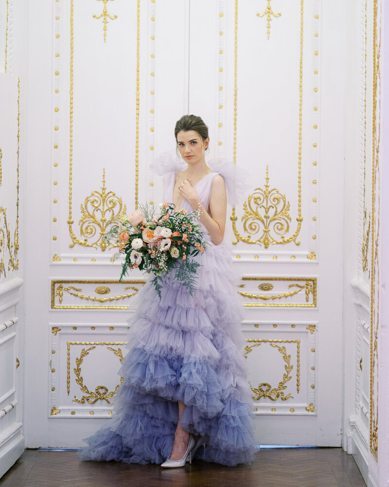 Bride wearing a lilac Millia London wedding dress at 10-11 Carlton House Terrace