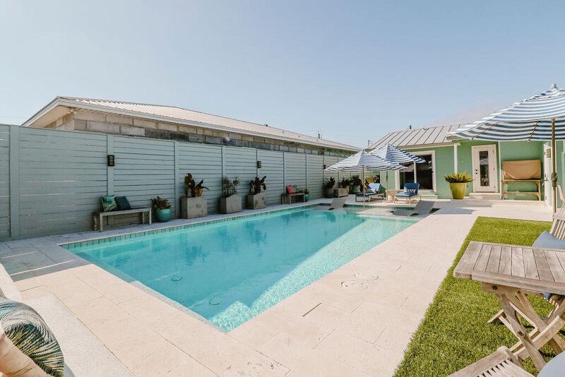 rectangular pool with in water loungers