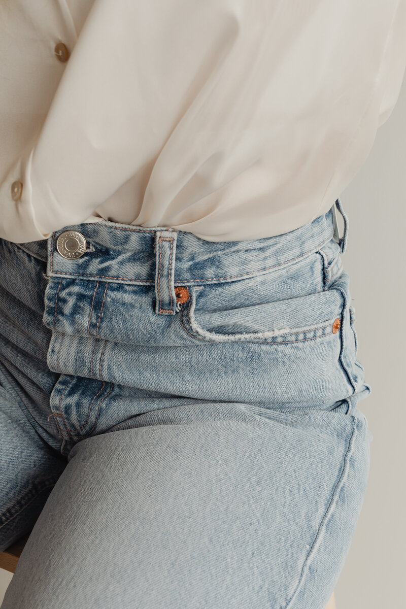 kaboompics_light-blue-jeans-white-silk-shirt-27719