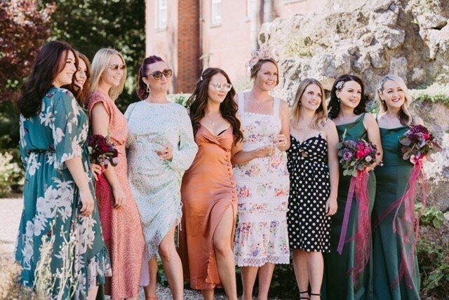 Wedding guests posing for a photo at Wotton House