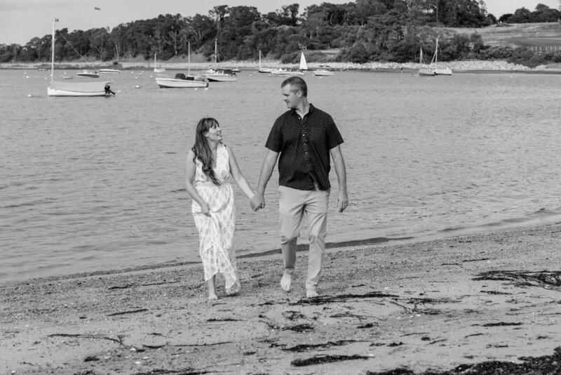Heidi and her husband Ted walking hand in hand on Cape Cod Beach | Maine Wedding and Portrait Photographer