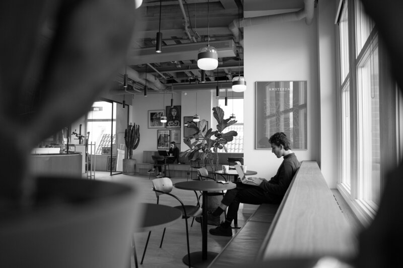 Business man sitting in front of laptop