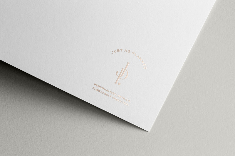 a mockup showing a stamp logo for a wedding planner