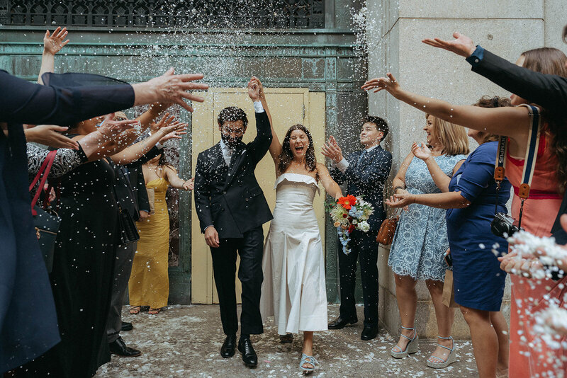 bride and groom church exit shot by elsie goodman nyc elopement photography
