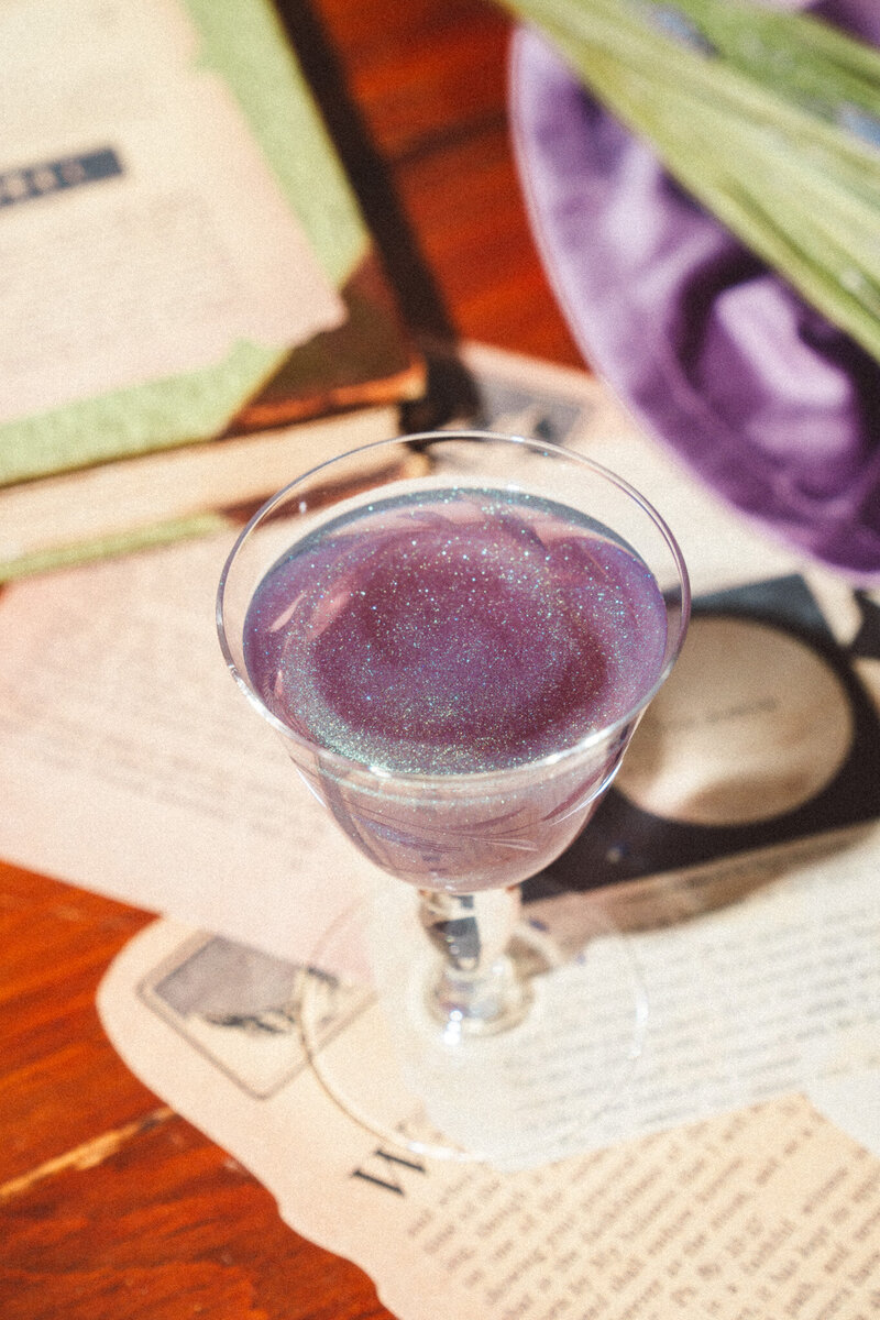 Photo of purple sparking elixir - specifically launch alchemy - Mettle & Tonic