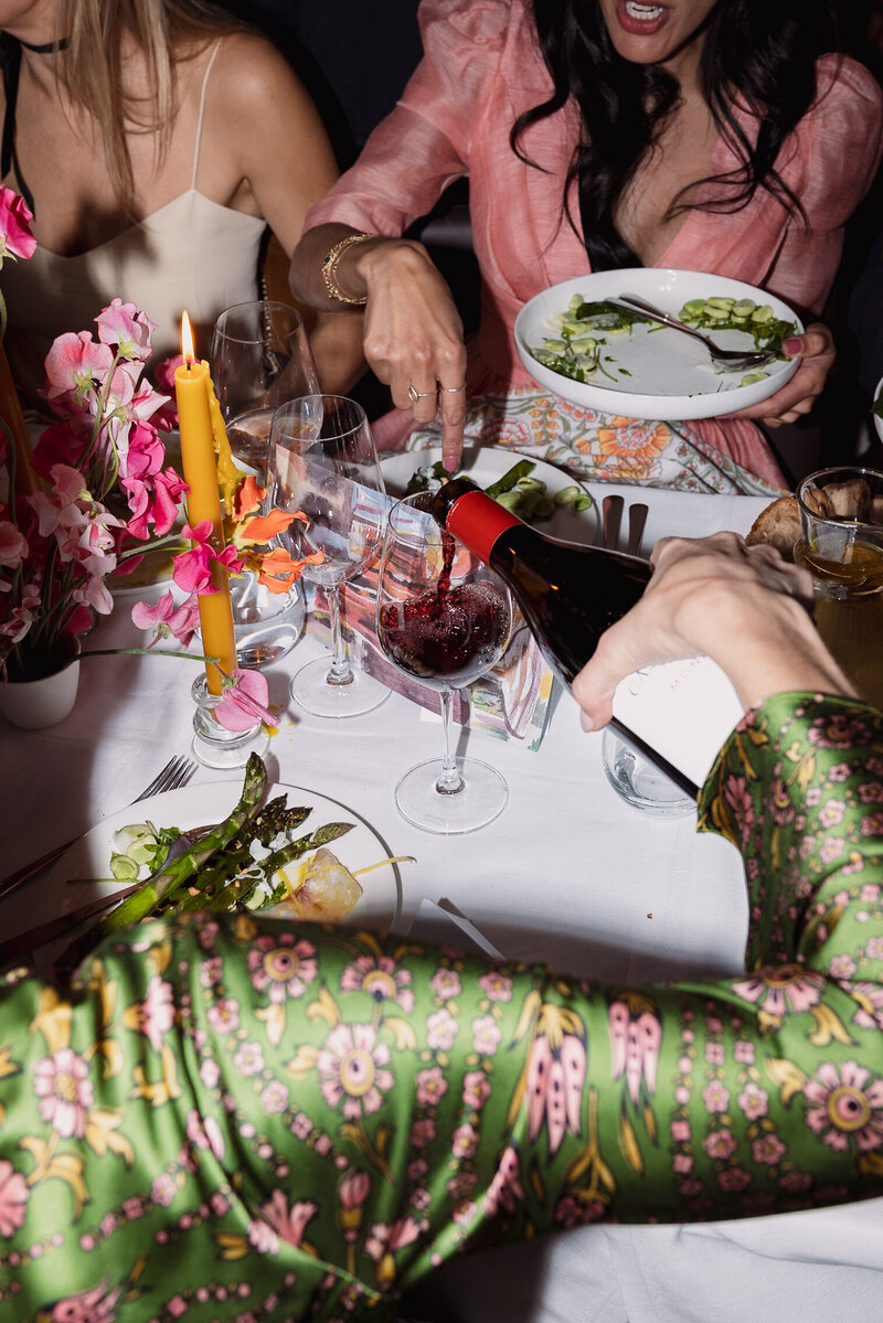 Wedding photographer captures couple taking a stroll hand in hand at their french chateau wedding.