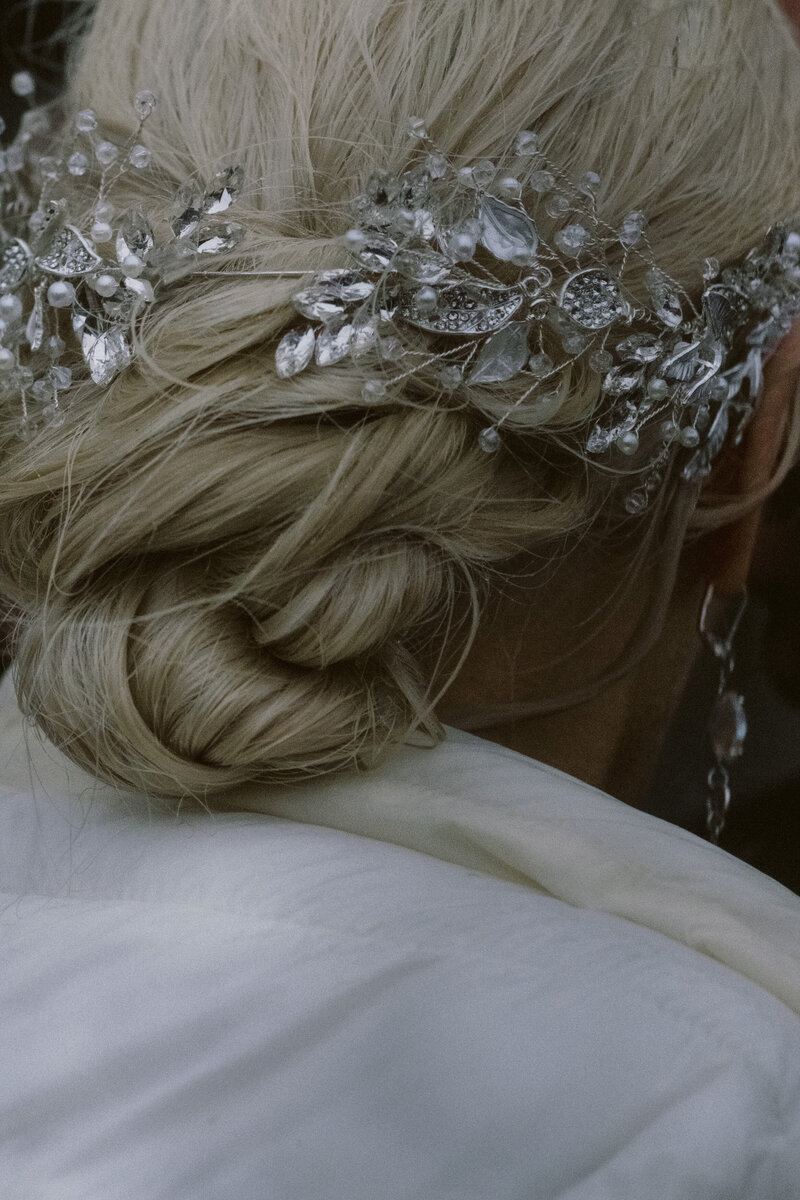 close up of the bride's hair with beautiful jeweled vintage inspired hair accessories