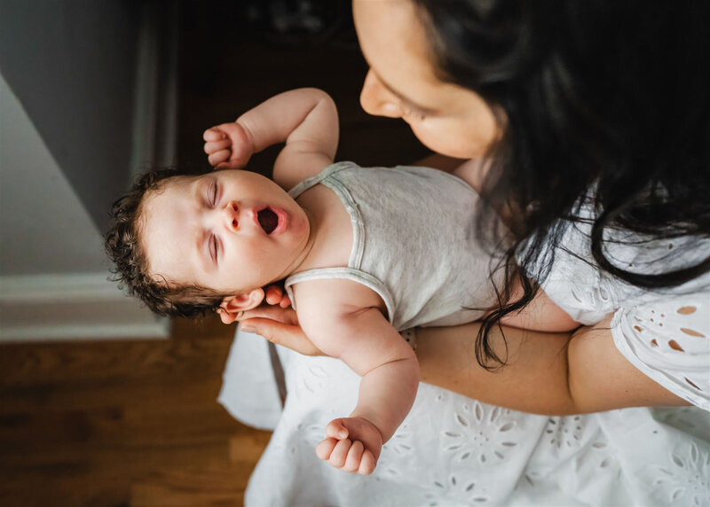 Photo of newborn baby and mom