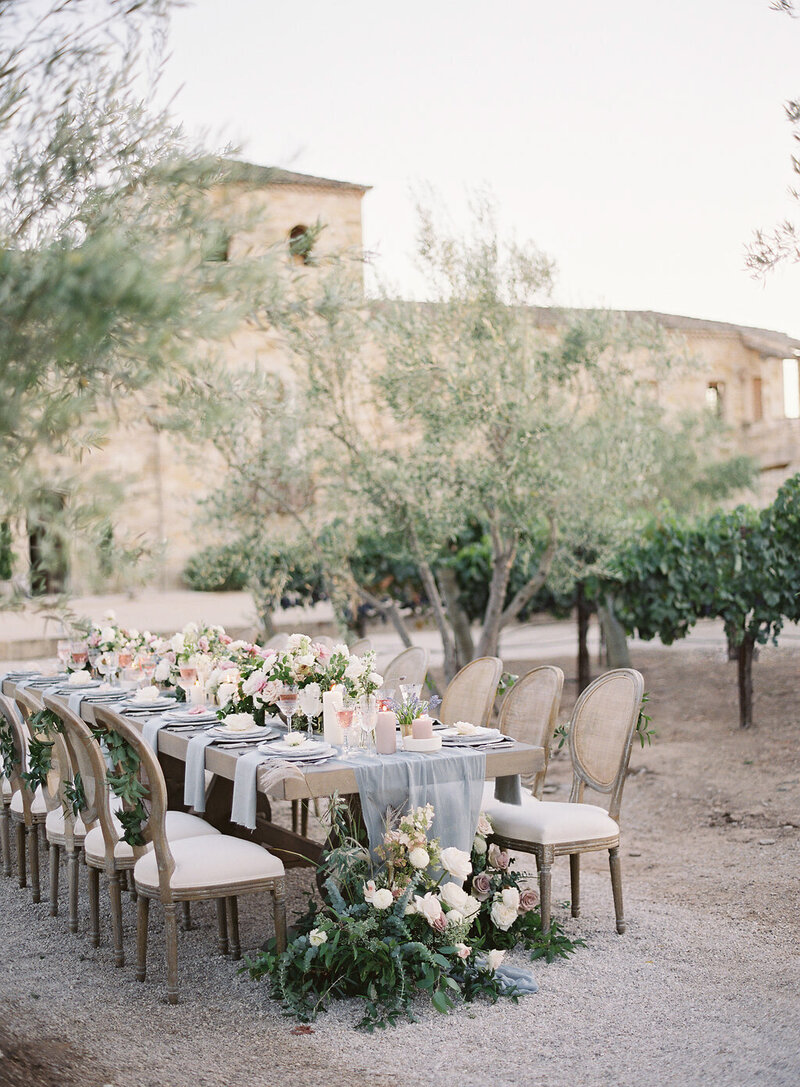 A couple walking into a wedding venue.