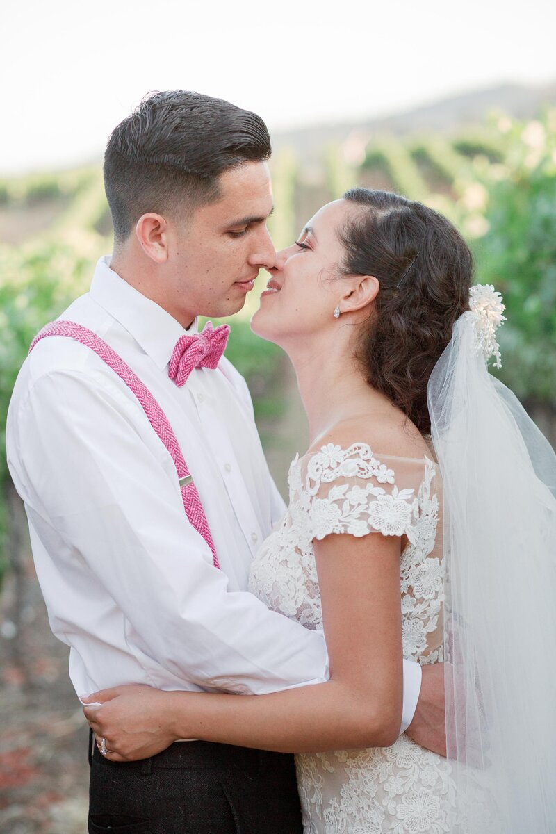 Wedding couple about to kiss by Inclusive Santa Barbara wedding photographers Renoda Campbell Photography