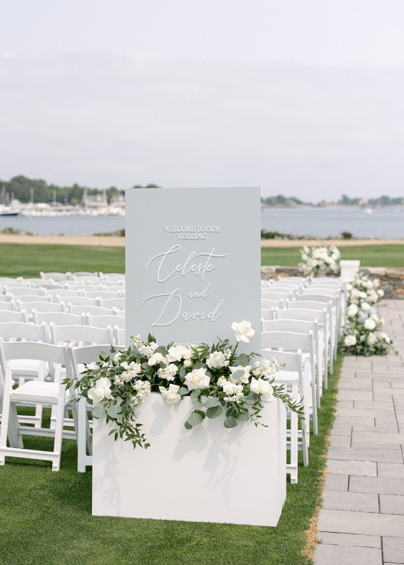 Statement White & Black Seating Chart with white florals and blue base