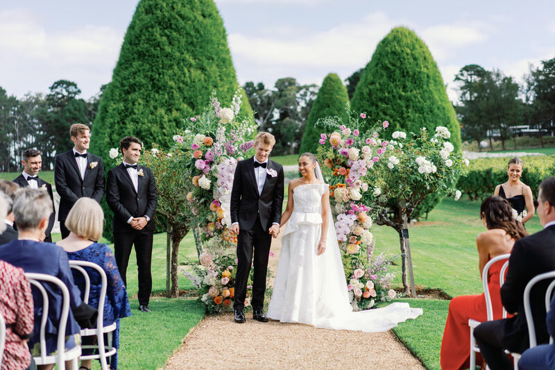 Bride & groom in intimate embrace at Werrible Mansion