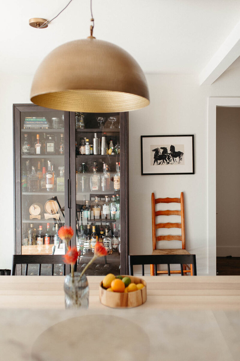 Modern, colorful dining room designed by Hope Miriam Designs in DFW