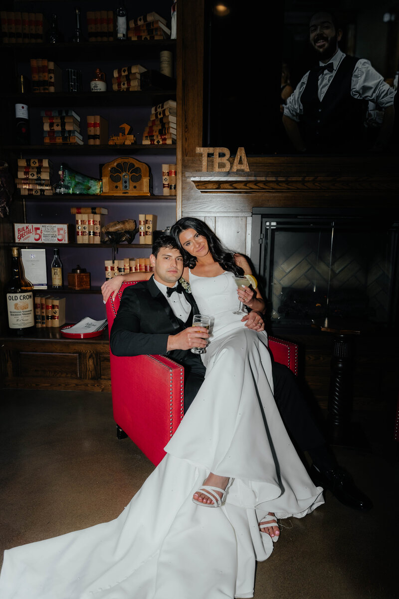 Pinterest Inspired Michigan wedding photographer capturing stylish bar lounge portraits for bold, modern couples who love editorial wedding storytelling.