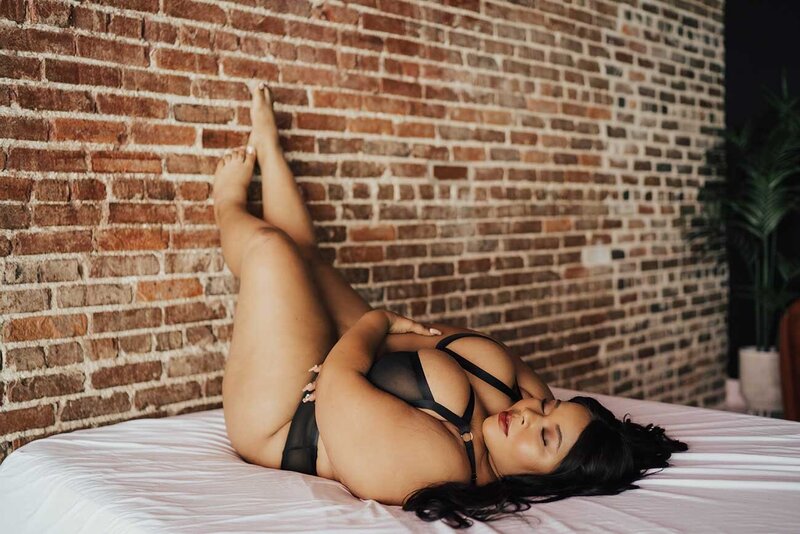 Boudoir-on-bed-and-brick-wall-Pompy-Portraits-Jacksonville-FL-48