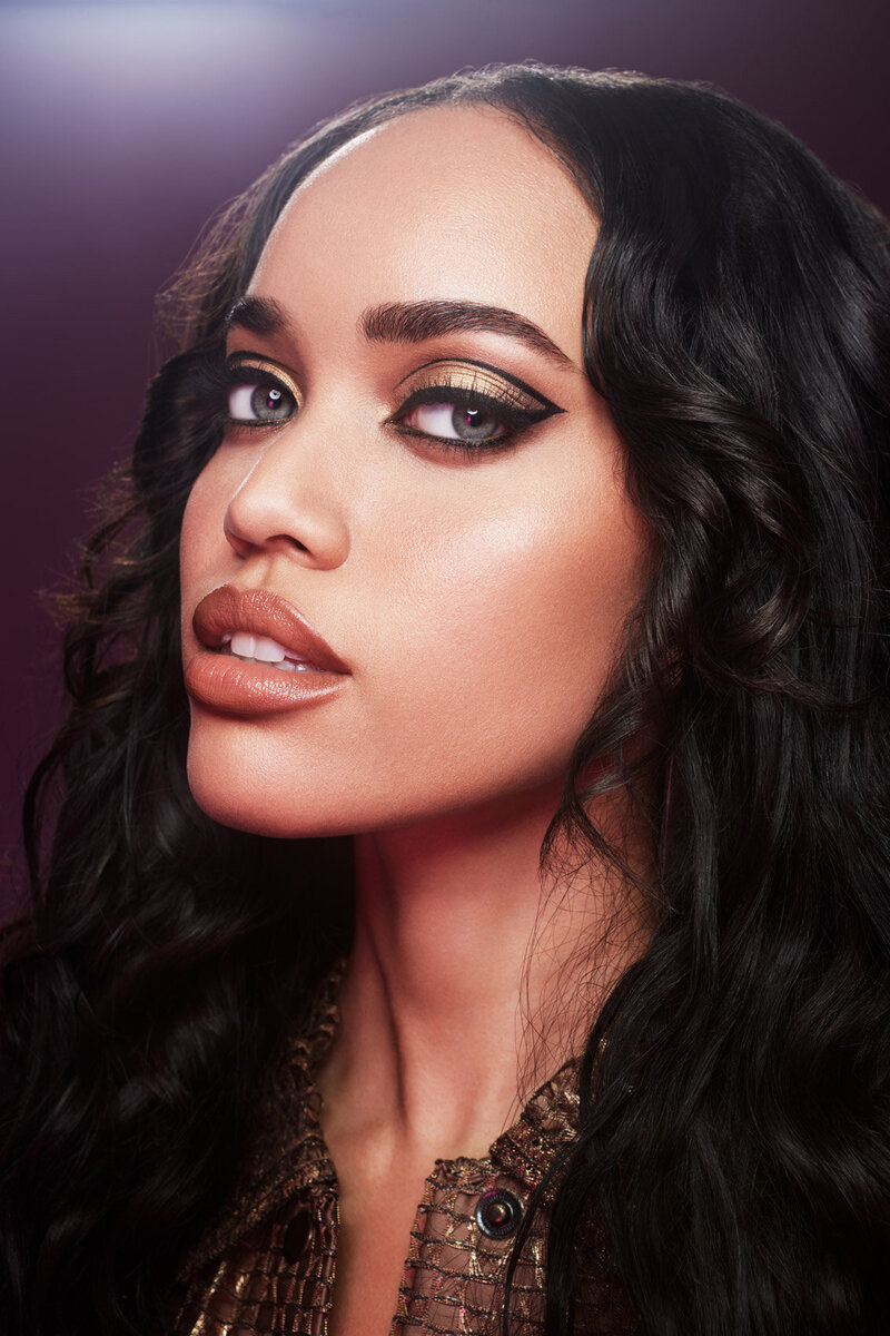Bold beauty portrait of Sena with dark, dramatic makeup and defined features, captured by Ylva Erevall.