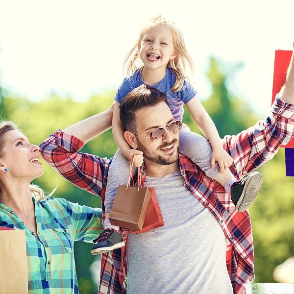 Family ejoying the weekend shopping.