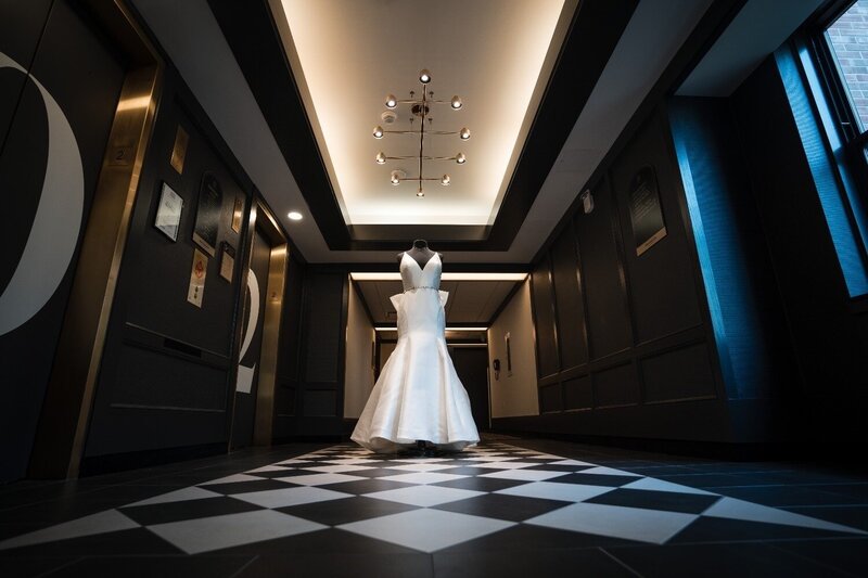 Wedding gown displayed in hallway at Union Club Hotel