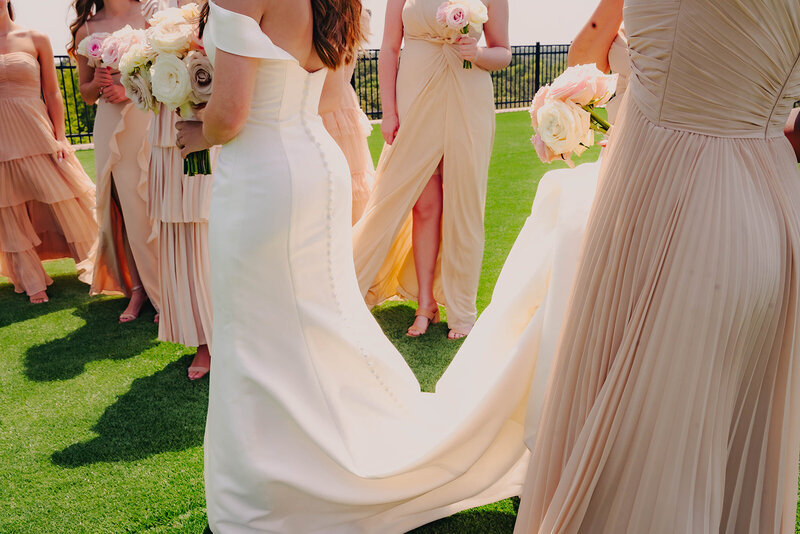 bride getting ready with bridesmaids at wedding in dallas texas