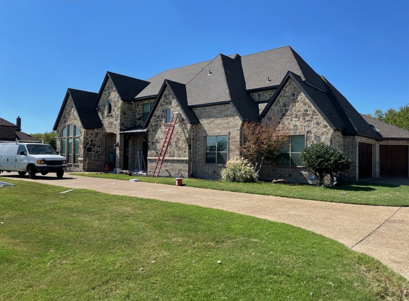 Recent residential roof installation from His & Hers Rooftop SOlutions