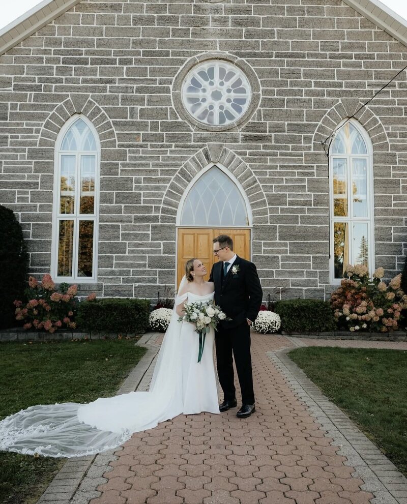 Bride and groom at a church in Winnipeg for their wedding