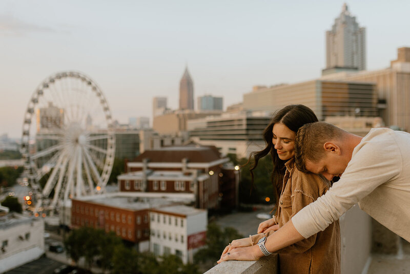 engagement photos atlanta skyline and ferris wheel