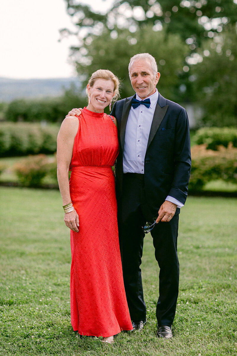 wedding guests playing bocce at wedding weekend venue in Upstate New York