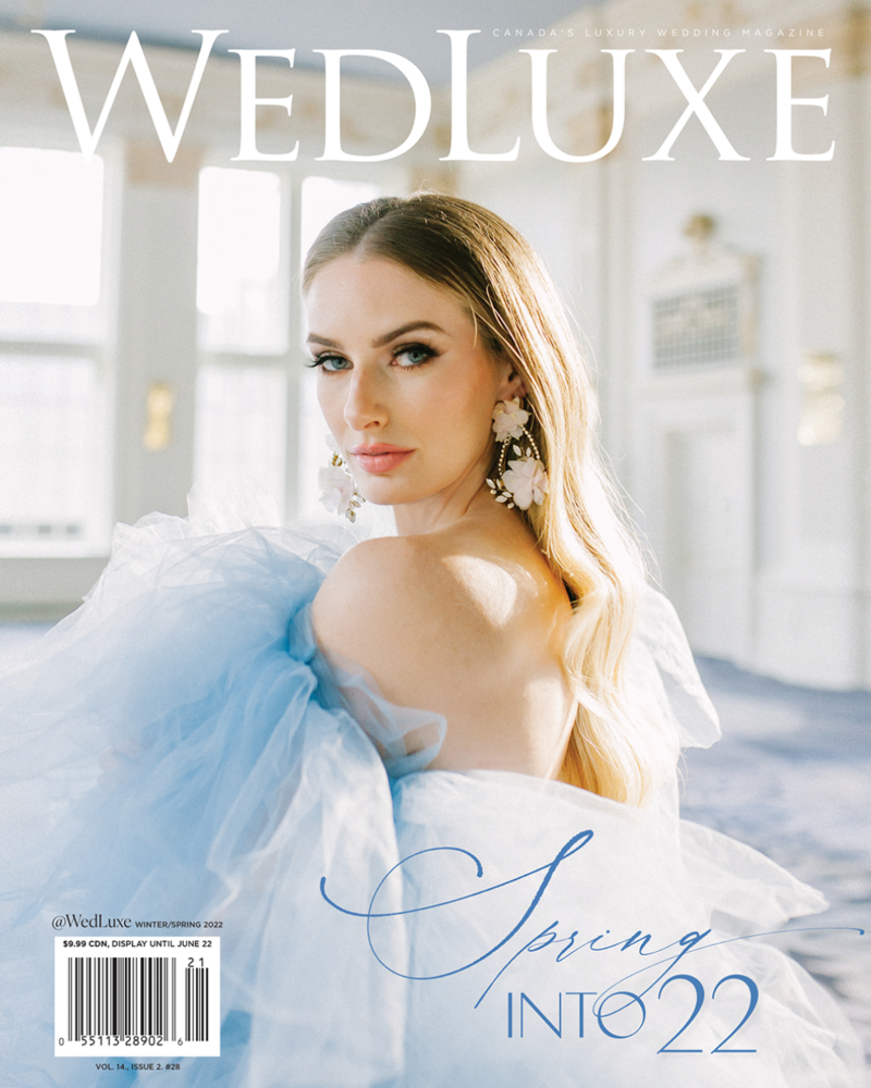 Bride in Millia London gown  on the cover of wedluxe magazine