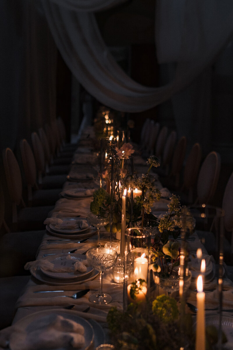 A candle lit wedding table scape in a luxury Italian wedding villa