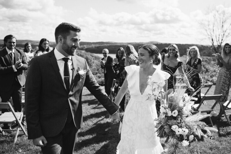 Happy Bride and Groom Walking