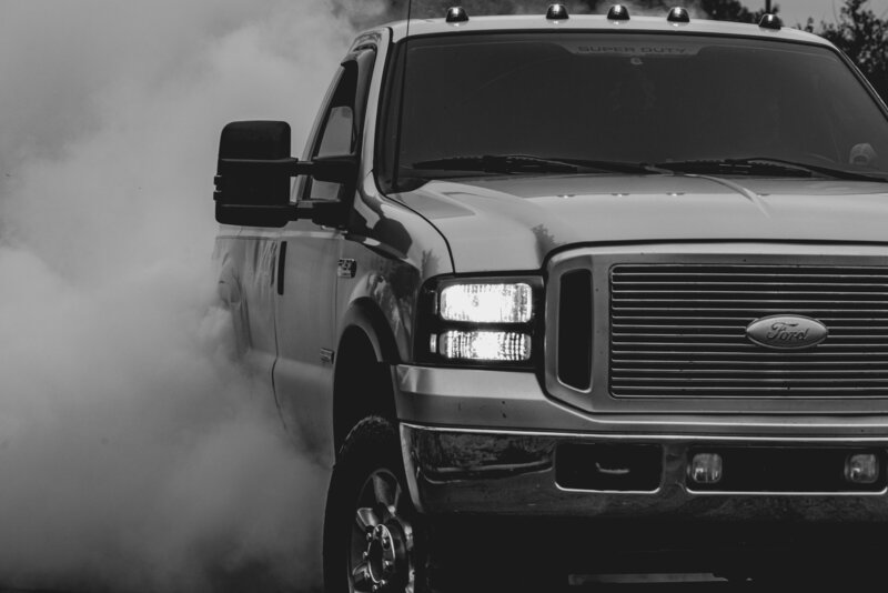 Ford Truck in cloud of dust, Ford F250, Ford F350