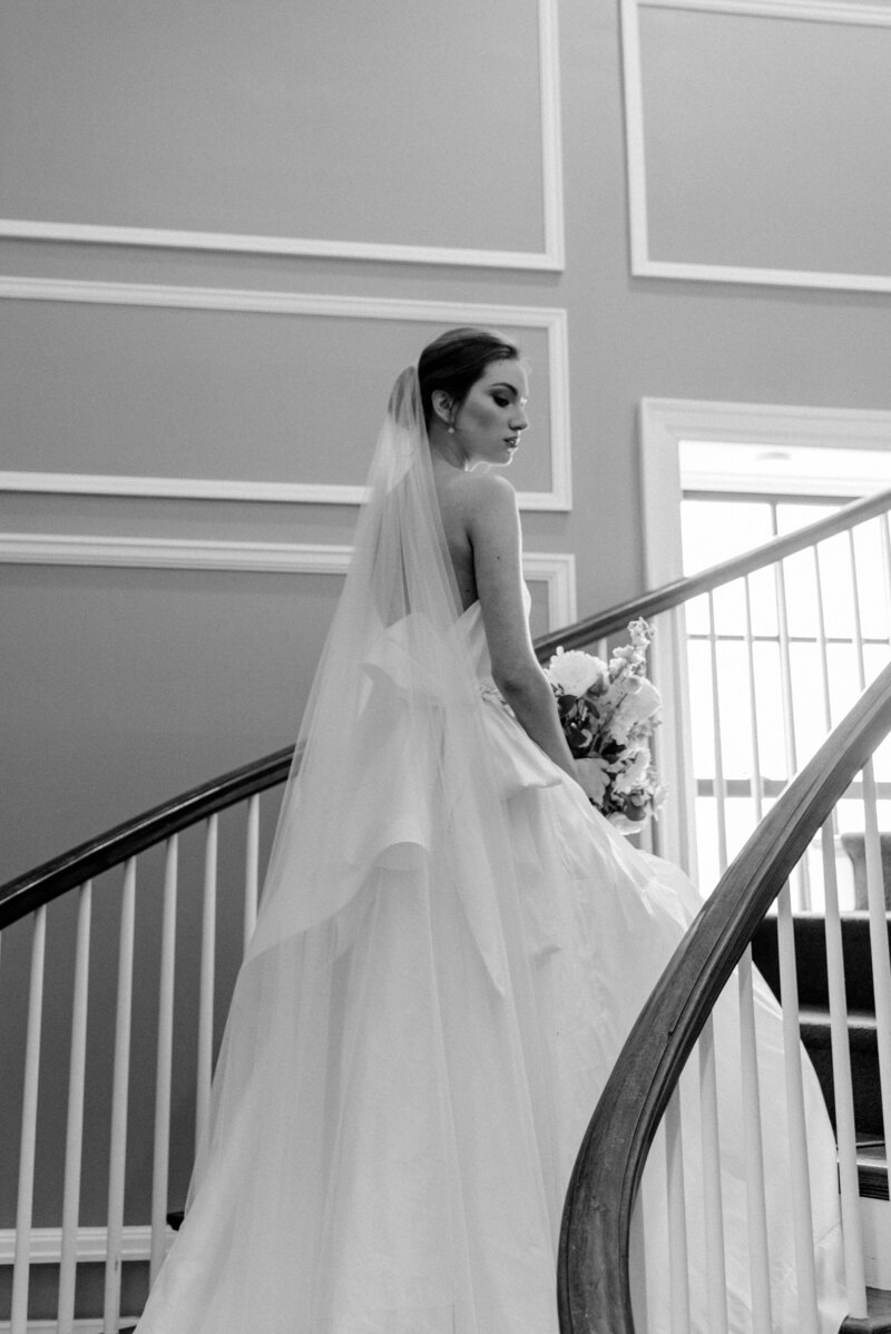 Bride and groom walk up memorial steps at their DC wedding