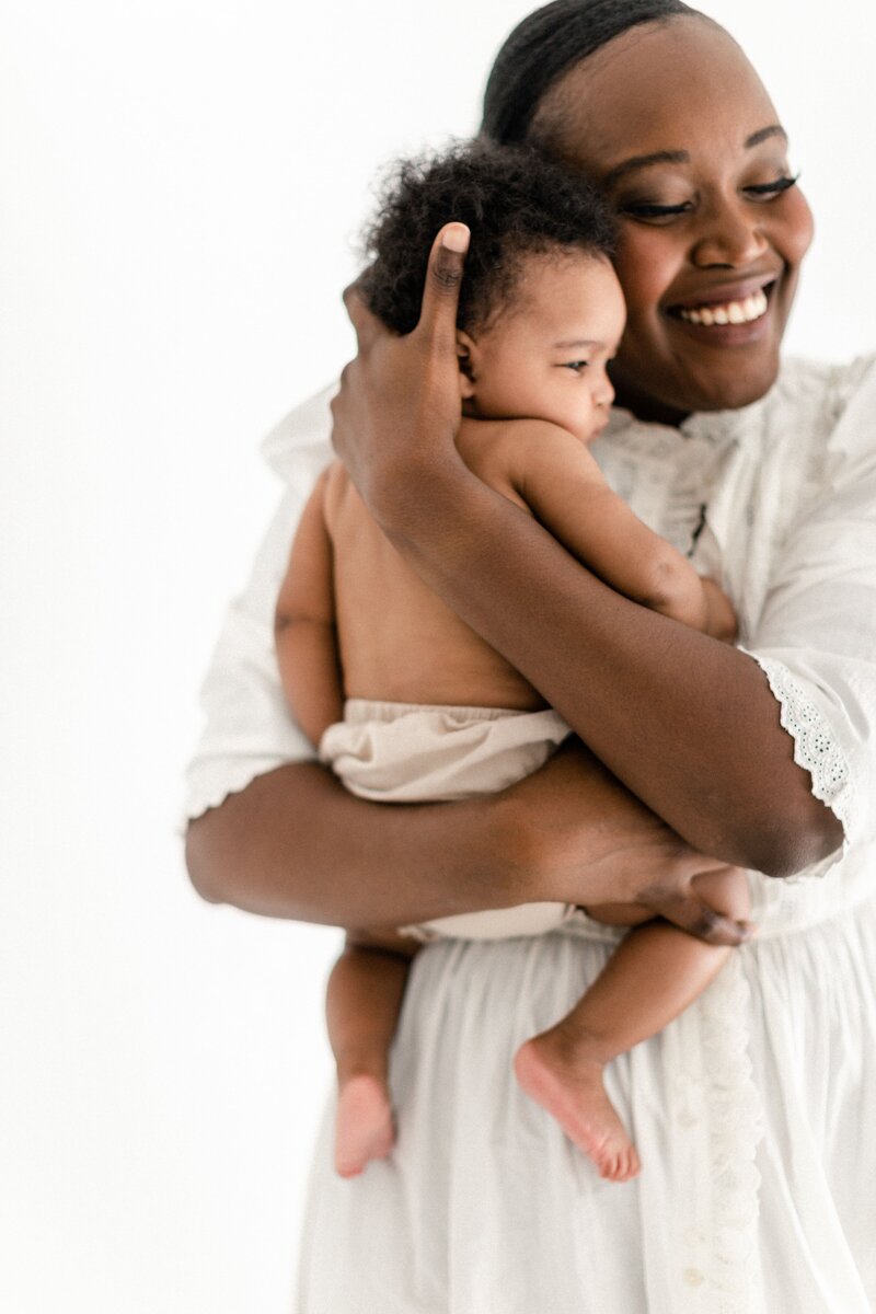 toddler picking flowers from learn to use your camera for moms course