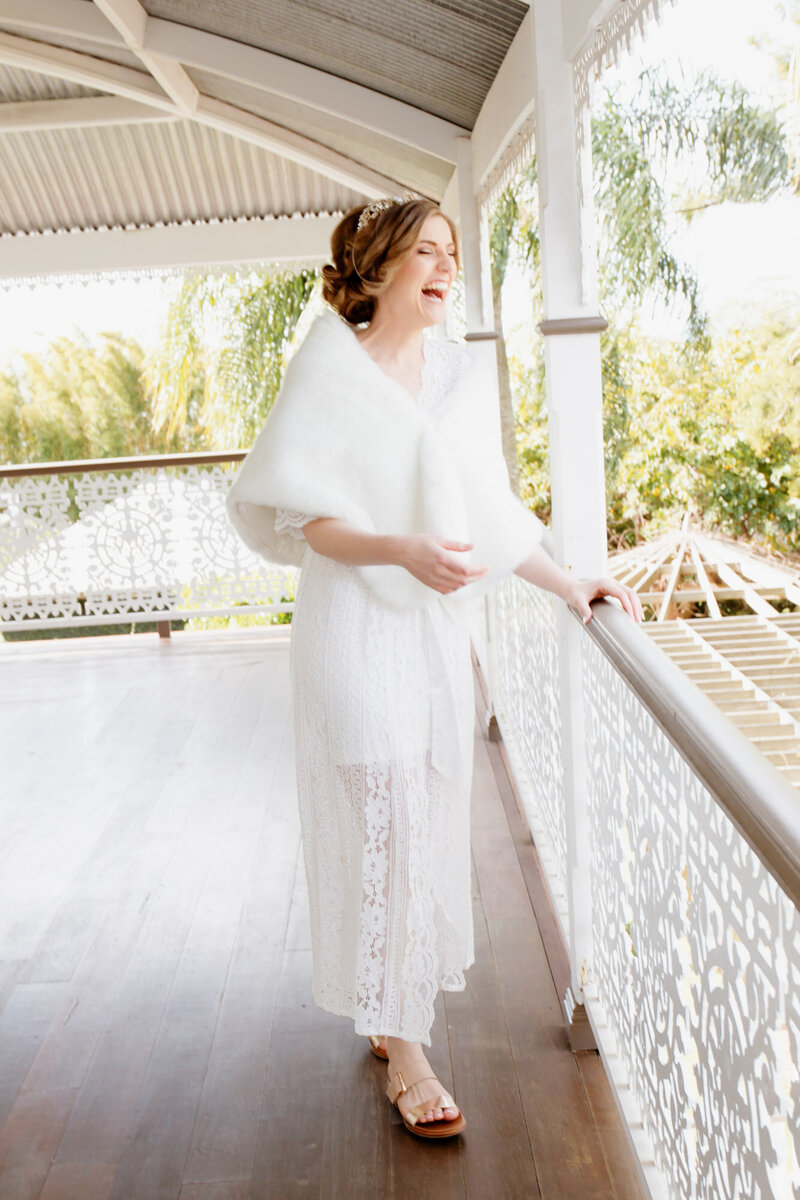 Happy bride at the the balcony